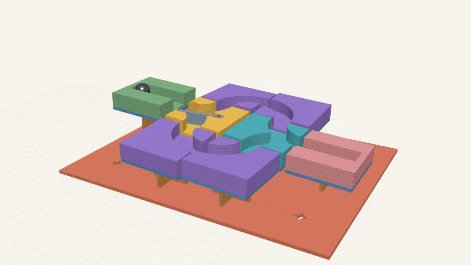 Laser-cut marble run tiles on columns: a start tile, a switch with a gate, curved branches, a merge and a finish tile on a base
