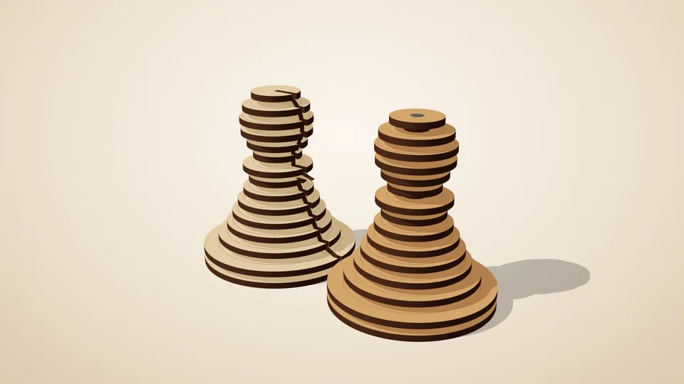 Two chess pawns made of stacked plywood layers